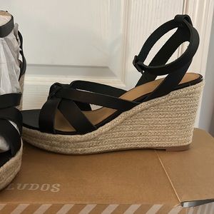 Black leather espadrilles.